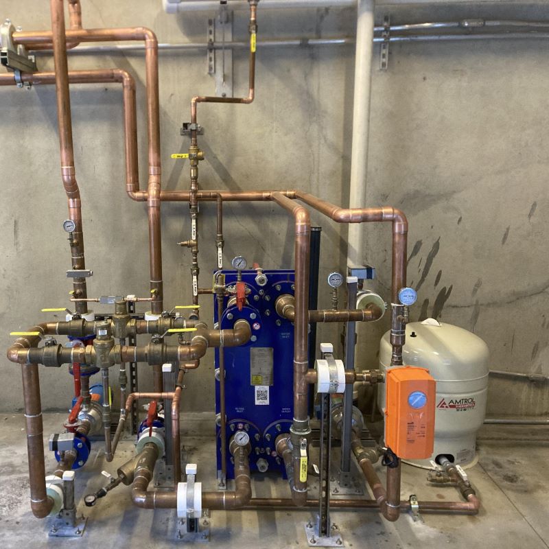 Custom copper manifold and valve cluster fabrication for industrial piping retrofitting by Advanced Piping Systems Inc.